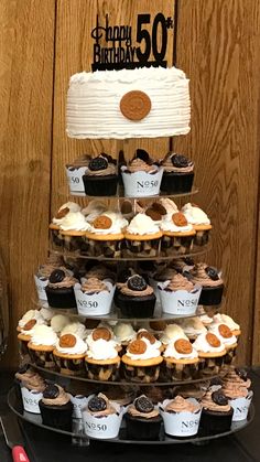 a cake and cupcakes on a table