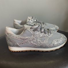 Sliver Glittery Tennis Shoes - Purchased From Online Boutique (Couldn’t Return) - Size 7.5 - Nwot Make A Offer! No Reasonable Offer Will Be Rejected!! Metallic Glitter Lace-up Sneakers, Spring Party Sneakers With Glitter Accents, Party Glitter Sneakers With Synthetic Material, Silver Sparkling Lace-up Sneakers, Casual Silver Sparkling Sneakers, Casual Silver Glitter Sneakers, Silver Lace-up Party Sneakers, Silver Party Sneakers For Spring, Spring Silver Party Sneakers