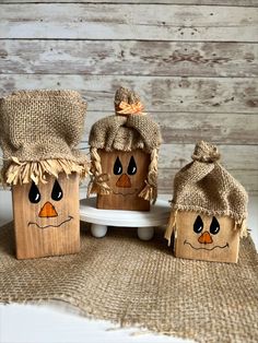 three little scarecrows made out of burlocks