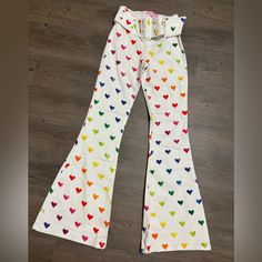 Brand New Without Tags These Pants Have A Twill Construction, A Removable Belt, A Button And Zip Closure, Flared Legs, And All Over Multicolored Heart Print. Care Bears, Heart Print, Dolls Kill, Flare Pants, Bottoms Pants, Pant Jumpsuit, Womens Bottoms, Bears, Pants For Women