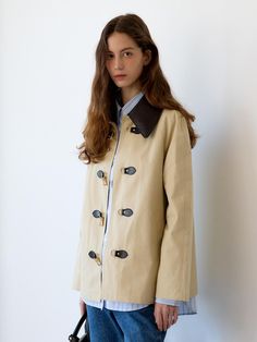 LA VIOLETTE focuses on a feminine yet chic style, offering details that allow for various variations, witty designs, premium materials, sophisticated fit, and meticulous tailoring. They aim for high quality in their products.- Half-length trench coat- Classic mood with a relaxed fit- Must-have item and a comfortable fit Beige Gabardine Outerwear With Concealed Placket, Chic Gabardine Outerwear For Office, Chic Office Outerwear In Gabardine, Beige Stand Collar Outerwear For Work, Beige Outerwear With Stand Collar For Work, Beige Outerwear With Hidden Button Closure For Work, Chic Gabardine Pea Coat For Office, Chic Beige Gabardine Outerwear, Office Gabardine Outerwear With Button Closure