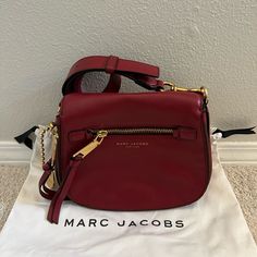 Excellent Condition Length: 9 In Width: 3 In Height: 7 In Drop: 22 In Red Saddle Bag With Gold-tone Hardware, Red Leather Saddle Bag With Gold-tone Hardware, Leather Satchel Bag, Satchel Bag, Leather Satchel, Satchel Bags, Lady In Red, Red Leather, Marc Jacobs