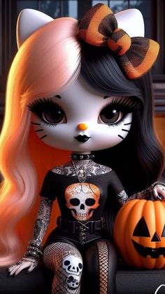 a doll with long hair sitting on top of a table next to a pumpkin and a cat