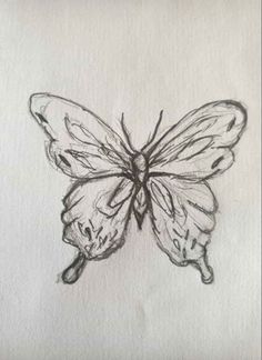 a black and white drawing of a butterfly