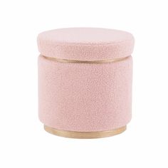 a round pink ottoman with gold trim on the top and bottom, in front of a white background