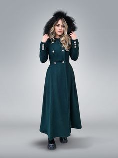 "Double-Breasted Women's Long Coat With Hood, Hooded Winter Maxi Coat Look at this gorgeous forest green winter coat, finished with a warm hood, this maxi wool coat will a good choice for your wardrobe. Made with a six-meter quality Wool and Cashmere blend, it keeps you warm, and the long silhouette gives it a nice dramatic look that makes a statement. A great add-on to your winter outerwear collection! !!Please keep in mind that forest green is a custom color. To get this color, you need to pur Green Winter Coat, Oc Clothes, Fit And Flare Coat, Winter Maxi, Winter Overcoat, Full Length Coat, Coat With Hood, Cashmere Fabric, Long Coat Women