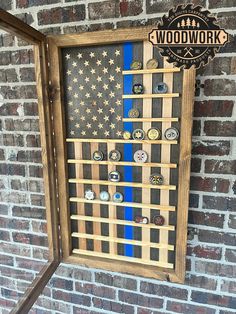 an american flag made out of wood with buttons on it and a sign that says woodwork