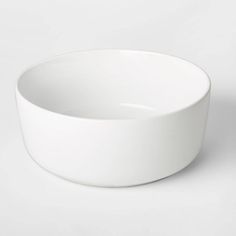 a white bowl sitting on top of a table