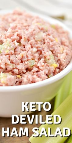 keto deviled ham salad in a white bowl with celery on the side