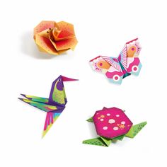 three origami birds and one bird on a white background