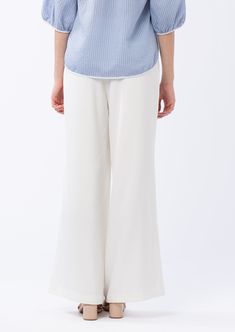 *This item eligible for store credit only.* These drapey trousers are the perfect piece to polish off your warm weather wardrobe. Crafted of soft crepe and fully lined, these trousers zip up the side to give you a flattering, clean silhouette. The Carter Trousers are finished with a thick high waistband and faux welt pockets in the back. Complete the look with the Anna Top. Classic fit : we recommend taking the next size up if in between sizes Inseam length 32 1/2" Faux back pockets Side waist i Chic Wide-leg Viscose Pants, Chic High-waisted Viscose Pants, Workwear Wide-leg Viscose Pants, Viscose Wide-leg Workwear Bottoms, Viscose Wide-leg Workwear Pants, Modern White Ankle-length Wide Leg Pants, Versatile High-waisted Viscose Pants, Wide Leg Viscose Workwear Pants, Solid Straight Viscose Pants