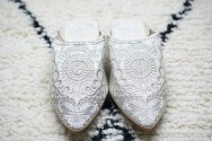 Moroccan Women Flat Wedding Shoes. The design is really gorgeous with stitched floral design. This decorated pair of moccasins women shoes was created for wear at a special occasion, such as a wedding, Moroccan party, indoor home, ... They are made of leather, with hand embroidered patterns, amazing gift bridal slippers. Hurry, take advantage of our best offers ever: 🌟 Buy 2 item And Get 10 % OFF 🌟 Your discount Apply Automatically at Checkout 🌟 Buy 3 item And Get 15 % OFF 🌟 Your discount Ap Bridal Moccasins, Elegant White Flat Heel Slippers, Elegant Round Toe Slippers For Galas, Elegant White Slippers With Round Toe, Elegant Slip-on Closed Toe Slippers, Elegant Closed Toe Slip-on Slippers, Elegant Slip-on Moccasins With Leather Footbed, Elegant White Slip-on Slippers, Elegant Slip-on Moccasins With Textured Sole