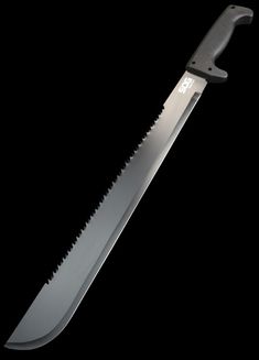 a knife that is on top of a black surface