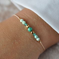 ✦ Gemstone Bracelet with malachite, Swarovski, 24k Gold Filled, Delicate adjustable bracelet, Minimalist Bracelet, Everyday Bracelet ✦ This bracelet made of beige jewelry string and natural stones with a size of 2mm to 4mm. ✔ 100% natural malachite (not synthetic) ✔ Peruvian turquoise ✔ Swarovski bicone crystals ✔ Czech beads covered with 24k gold ✦ The bracelet is adjustable thanks to the macrame weaving technique, it is comfortable to put on.  The nylon string makes the bracelet very durable ✦ Your bracelet will be packed in a hand made envelope with a brand logo, making it perfect for gifting  ✦ If you want to give jewelry to a loved one and leave a message for them, give me its content in the message when buying  ✦ Perfect bracelet: ✦ * for myself :) * as a gift for mom/sister/friend * Handmade Adjustable Beaded Bracelets For May Birthstone, Elegant Adjustable Green Friendship Bracelets, Malachite Beaded Bracelet As A Gift, Adjustable Minimalist Beaded Bracelets For May Birthstone, Gold Friendship Bracelets With Natural Stones As Gift, Adjustable Gemstone Bracelet, Malachite Gemstone Bracelets As Gift, Minimalist Adjustable Crystal Bracelet With Gemstone, Elegant Handmade Malachite Bracelets