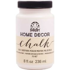 a jar of chalk that is white with black trim