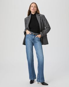 This sleek wide leg is designed with a high-rise and a flattering bow leg. This pair is crafted in PAIGE VINTAGE denim with a portion of organic cotton and comes in a light/medium wash with lived-in details. PAIGE VINTAGE takes all the work out of breaking in your favorite pair of vintage jeans. We've combined the comfort of stretch with everything you love about authentic vintage denim to create super soft jeans that feel perfectly lived-in from the very first wear. Eco-positive methods and mod Classic Denim Wide Leg Pants For Fall, Chic Wide Leg Jeans For Business Casual, Medium Wash Wide-leg Flare Jeans For Work, Fall Medium Wash Cropped Wide Leg Pants, Fall Cropped Wide Leg Pants In Medium Wash, Chic Denim Wide Leg Pants For Fall, Wide Leg Flare Jeans In Medium Wash For Work, Classic Wide-leg Jeans For Fall, Chic Medium Wash Wide Leg Pants For Fall