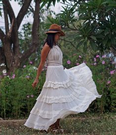 "Boho Maxi Full Circle Wedding Skirt Tiered full circle long skirt made from unbleached and undyed raw cotton in off-white color. Sizing: Made in one size to fit S to L / US: 4/6/8/10/12 Measurement; Elastic waist 24-40\" Hip max 50\" Length 41\" Bottom hem circumference 100\" **Model is a size US 6. 33\" bust, 36\" hip. 165 cm tall** Description: Stunningly beautiful maxi full circle skirt made from raw cotton material. Lined with the same fabric to knee level (not see-through). Full elastic wa Gathered Maxi Skirt For Beach, Maxi Length Gathered Skirt For Beach, Beach Maxi Length Gathered Skirt, White Bohemian Dress With Flared Skirt, White Bohemian Flared Skirt Dress, White Relaxed Bohemian Maxi Skirt, Peasant Style Tiered Beach Maxi Skirt, Peasant Style Flowy Maxi Skirt For Beach, Beach Tiered Peasant Maxi Skirt