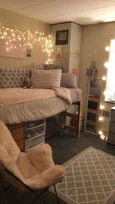 a dorm room with lights strung above the bed