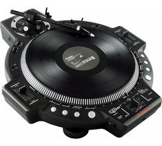 a turntable that is sitting on top of a white surface with black trims