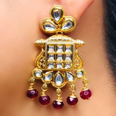 These are a beautiful pair of Earrings, made with beautifully Kundan beaded. These earrings work well with all types of clothing, whether it be formal attire or a casual party. Option 1 : Red Color (E722) Option 2 : White Color (E723) Eye-catching and unique jewellery that will set you apart. Gift this piece to a loved one, and see their face light up with joy. Best for gifting or for personal use, wear it to any occasion and be in the spotlight. Kids Handicraft, Saree Jewellery, Silver Pooja Items, Glass Bangles, Silver Toe Rings, Ruby Beads, Gold Chain With Pendant, Kundan Earrings, Silver Anklets