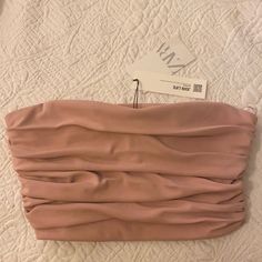 Dusty Rose Crop Top Strapless Has Boning To Stay Up Side Zipper Closure Very Cute Top. With Ruching This Is Such A Cute Top. However, I Lost A Ton Of Weight And It Didn't Fit. Brand New Still With Tags. Chic Pink Stretch Crop Top, Chic Stretch Pink Crop Top, Pink Bandeau Top For Night Out, Trendy Pink Bandeau Crop Top, Feminine Pink Crop Top For Night Out, Chic Pink Strapless Tube Top, Pink Bandeau Top For Parties, Ruched Bandeau Crop Top For Party, Elegant Pink Strapless Tube Top