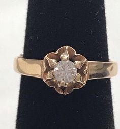 Vintage 14K Yellow Gold 1/4 CT ROUND DIAMOND Flower Engagement Ring Beautiful! Gorgeous ring! * Crafted in solid 14K yellow gold, the ROUND cut center diamond is approximately .25ct. G/H color. * Very pretty ring! * 2.3 grams * Size 6.75 with sizer (there is a sizer in ring band)  * Will ship Insured Classic 14k Stamped Yellow Gold Flower Ring, Classic 14k Stamped Flower Ring For Anniversary, Formal 14k Gold Flower Diamond Ring, Yellow Gold Flower Ring With Single Diamond, Yellow Gold Solitaire Diamond Flower Ring, Black Opal Pendant, Locket Ring, Sterling Silver Wedding Band, Flower Engagement Ring