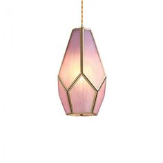 a pink and gold hanging light fixture