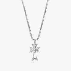 White Gold Cross Jewelry For Spiritual Style, Spiritual White Gold Cross Jewelry, Elegant Silver Crucifix Necklace, Classic Sterling Silver Crucifix Necklace, Timeless Silver Cross Pendant Necklace, Classic Engraved Crucifix Necklace, Elegant Cross Pendant Necklace With Silver Chain, Elegant Necklace With Silver Chain And Cross Pendant, Classic Silver Crucifix Necklace