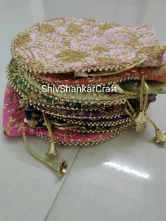 "Lot Of 100 Indian Handmade Women's Embroidered Potli Bag Bindi Pouch Mehndi Decor Gift Weeding Gift Return Gift for Guests Coin Pouch Shagun Note -: we are deal in wholesale also. we have all decorative items. If you have any query please feel free to ask. Please visit our shop Product Item -: Hand Bags Size -: Length- 9\" inches , width- 9\"inches Material -: Fabrics, Beads You can use this item for gift for guests, wedding, party, festive and any occasion. This colorful Clutch Purse with vibrant colors & ethnically designed is a specialty from Rajasthan artisans. India comes to life through rich colors, lavish embroidery, and sequins that emulate the region's traditional appliqué. Designed with the heart, this beautiful Potli bag with eye-catchy handle and used premium brocade material. Colorful Clutch, Embroidered Clutch Purse, Pouch Drawstring, Gift For Guests, Potli Bag, Mehndi Decor, Embroidered Clutch, Return Gift, Potli Bags