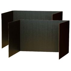 three pieces of black cardboard stacked on top of each other