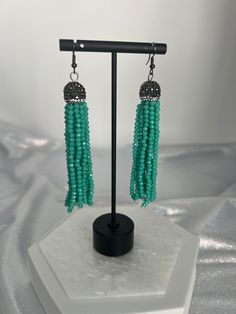 These earrings will add just the right sparkle to your outfit, and the turquoise beads create an interesting look. They go well with most necklines and dress styles, and the stone beads will look and feel amazing. Your Outfit, The Stone, Turquoise Beads, Tassel Earrings, Dress Styles, Christmas Sale, Sterling Earrings, Stone Beads, Rainbow Colors