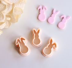 three cookies shaped like bunnies sitting next to each other