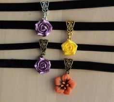 The choker s with handmade charms: 1.Lilac pearl rose choker 2. Yellow pearl rose choker 3. Burned orange hibiscus choker You can choose the silver or bronze toned findings ( clasp and bail) for your necklace the skinny choker with width 7 mm You can easy detach the pendant from ribbon and wear only chocker without charm or put other charm. Rose dia 15-17 Dia of hibiscus 17 mm Length of choker is adjustable: Length of necklace is adjustable: 10-12 inches/ 25,4 - 30,5 cm 11-13 inches/ 28-33 cm 12 Flower Charm Choker As A Gift, Floral Choker With Flower Charm As A Gift, Flower Shaped Choker With Flower Charm As Gift, Adjustable Flower Charm Choker, Adjustable Flower Pendant Choker For Gift, Adjustable Flower Pendant Choker Gift, Gift Flower Pendant Adjustable Choker, Rose Design Choker Necklace, Adjustable Rose Choker Necklace