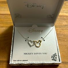 the disney mickey love you necklace is in its box