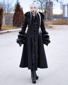 Gothic Costume Outerwear For Winter, Alternative Long Coat For Costume, Vampire Style Winter Costume Outerwear, Gothic Winter Larp Outerwear, Gothic Winter Outerwear For Cosplay, Winter Costume Long Coat, Long Coat For Halloween, Winter Long Fur Coat With Feather Trim, Winter Costume Outerwear With Faux Fur Lining