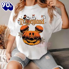 Disneyland Mickey Mouse Halloween Shirt This versatile T-shirt is perfect for everyone, combining style and comfort. Made from soft, high-quality fabric, it features a classic fit that suits any body type. Ideal for casual wear or layering, this T-shirt comes in a variety of colors to match any wardrobe. Its durable construction ensures long-lasting wear, making it a staple piece for both men and women Photos Of Disneyland Mickey Mouse Halloween Shirt Product details: Disneyland Mickey Mouse Hal Disneyland Mickey Mouse, Mouse Halloween, Disneyland Halloween, One Piece Cartoon, Mickey Mouse Halloween, Flip Flop Boots, Canvas Loafers, Mickey Mouse Cartoon, Disney Lilo