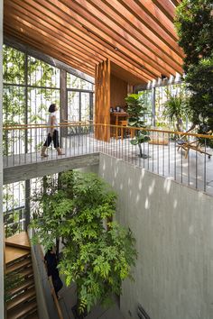 a person walking up some stairs in a building