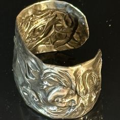 Thank You For Looking At This One Of A Kind Handmade Bracelet Repurposed From A Very Rare Antique From The Victorian / Art Nouveau Era. This Is Tested Solid Sterling Silver That Is Over 100 Years Old. This Motif Is Of A Lady Face From The American Beauty Collection The Sterling Is Tested This Is Similar To The Spoon Ring Type Jewelry, The Sterling Is Upcycled, And Sustainably Preserved Into Jewelry . This Is My Original Creation And Concept 11.3 Grams Of Sterling -Light Weight 1.25 Inches Wide F Adjustable Fusion Metal Cuff Bracelet, Handmade Fusion Metal Cuff Bracelet, Handmade Fusion Style Metal Cuff Bracelet, Handmade Metal Fusion Cuff Bracelet, Adjustable Silver Fusion Cuff Bracelet, Artistic Silver Cuff Bracelet, Hand Cast Bracelet Jewelry, Artistic Silver Cuff Bangle Bracelet, Artistic Silver Cuff Bracelet Bangle