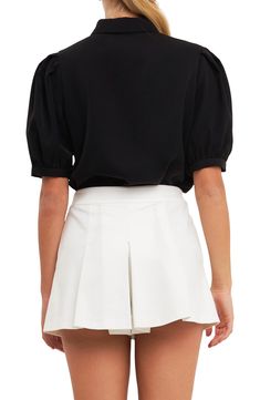 Elbow-length puff sleeves frame this woven blouse featuring a stone-embellished button-up closure and a sleek point collar. Point collar Elbow-length sleeves 100% polyester Hand wash, dry flat Imported English Factory, Blouse Nordstrom, Puff Sleeve Blouse, Puff Sleeve Top, Elbow Length Sleeve, White Tops, Black Blouse, Types Of Collars, Puff Sleeves