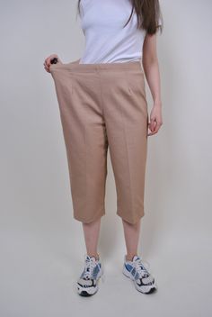 "90s beige chino capris, vintage women straight long shorts, Size W 34 Welcome to TARASCOMMON.ETSY.COM Unique clothing from the 20th century. Model tall 170cm. Size: FR/B - 44; Eur - 42; UK 16; Width - 39-49cm / 15.35-19.29inch; Length - 80cm / 31.49inch. All measurements are taken seam to seam while lying flat. Cotton. Polyester. This item is vintage, so it can have some defects. Additional photos can be send We are glad that you are interested in lots that we sell. Wish you a good shopping! FO Casual Beige Knee-length Pants, Beige Knee-length Workwear Shorts, Beige Stretchy Knee-length Bottoms, Beige Stretch Capris For Spring, Stretch Beige Capris For Spring, Beige Stretch Short Length Pants, Beige Capri-length Bottoms With Pockets, Spring Beige Stretch Capris, Beige Bermuda Shorts For Work