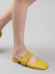 Editor's NotesAMELLIE presents contemporary design shoes  basic but essential pieces for a daily look. - Soft sheep leather- Modern chic squared-toe line- Set on a low heel for a comfortable fit- Unique banding strap details- Yellow with a light green color is good to wear in spring- Nice to give a subtle point- Cushioned insole and non-slip rubber outsole Measurements(in.)- Size: KR225mm(US5.5)-KR250mm(US8)   - Heel height: 0.78 in- KR240mm(US7): Front toe length 2.95 i Chic Slip-on Square Toe Flats, Chic Slip-on Flats With Square Toe, Trendy Leather Flats With Square Toe, Modern Summer Flats For The Office, Modern Summer Office Flats, Modern Office Flats For Summer, Leather Square Toe Flats For Summer, Leather Flats With Square Toe For Summer, Slip-on Flats With Square Toe For Spring