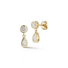 14kt Round and Pear Diamond Drop Earrings The Diamanté Collection takes its inspiration from Mateo's recent visit to the De Beers Orapa Diamond Mine in Botswana. Mother Nature has done a fantastic job creating these magnificent diamonds. Our only duty was to simply highlight each stone for daily wear. Round and Pear shape diamonds are beautifully bezel set in solid gold. 14kt Yellow Gold 1.47gm Gold 0.94ct Diamonds Post Back Made in New York City Timeless Pear-shaped Brilliant Cut Earrings, Luxury Diamond Earrings With Timeless Design For Anniversary, 14k Gold Earrings For Anniversary With Timeless Design, Timeless Gold Pear-shaped Diamond Earrings, Fine Jewelry Earrings For Anniversary With Timeless Design, Fine Jewelry Earrings With Timeless Design For Anniversary, Timeless Pear-shaped Gold Diamond Earrings, Timeless Fine Jewelry Earrings For Anniversary, Timeless Yellow Gold Teardrop Diamond Earrings