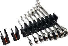 a bunch of tools that are laying on top of each other in the same direction