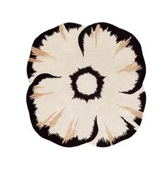 a black and white rug with an abstract flower design on the center, in front of a white background