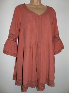 April Cornell  - 70's, Indie, Hippie, Boho, Artis, Poet inspired Tunic - Dress  - New With Tag Label size - Small, Canadian generous size  shoulder to shoulder seam - 15 3/4" or 40 cm bust from pit to pit - 20" or 50 3/4 cm waist - free  shoulder seam to hem - 32" or 81 1/4 cm sleeve from pit to cuff - 13 1/2" or 34 1/4 cm Garment was measured flat, please double where appropriate.  "Our garments are designed for you; the artist; the mother and the sister. In every way to say "you", we celebrate Cotton Tunic Dress With Lace Trim, Red Bohemian Short Sleeve Tunic, Bohemian Pink Long Sleeve Tunic, Casual V-neck Peasant Top With Tassels, Bohemian Brown V-neck Tunic, April Cornell, Cord Lace, Lace Hem, Lace Inset