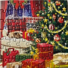 a jigsaw puzzle with a christmas tree and presents