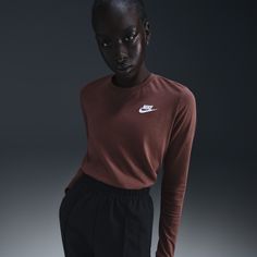 It's hard to beat classic and comfy. This long-sleeve tee is made with soft, lightweight cotton and an easy fit that's perfect for everyday wear. Nike Crew Neck T-shirt For Fall, Fall Sports Long Sleeve T-shirt, Long Sleeve Cotton Sportswear T-shirt, Sporty Long Sleeve Crew Neck Top For Fall, Sporty Long Sleeve Top With Crew Neck For Fall, Nike Long Sleeve Sports T-shirt, Basic Nike Crew Neck Top, Nike Crew Neck Sportswear Top, Nike Sportswear Crew Neck Tops