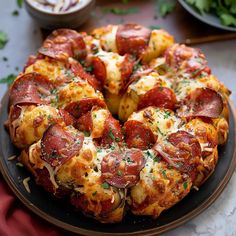 a pepperoni and cheese pizza on a plate