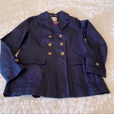 Banana Republic Gold Buttoned Navy Jacket Pink Interior Large Front Pockets Size: Medium Back Length: About 27 Inches Armpit To Armpit: About 19 1/2 Inches New With Partial Tags Navy Blazer With Button Cuffs, Navy Long Sleeve Blazer With Button Cuffs, Navy Long Sleeve Outerwear With Button Cuffs, Spring Single Breasted Peacoat With Lapel Collar, Spring Single-breasted Peacoat With Lapel Collar, Chic Navy Outerwear With Button Closure, Chic Navy Outerwear With Buttons, Spring Double-breasted Sport Coat With Buttons, Spring Long-sleeve Peacoat For Work