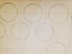 a drawing of six circles on a sheet of paper